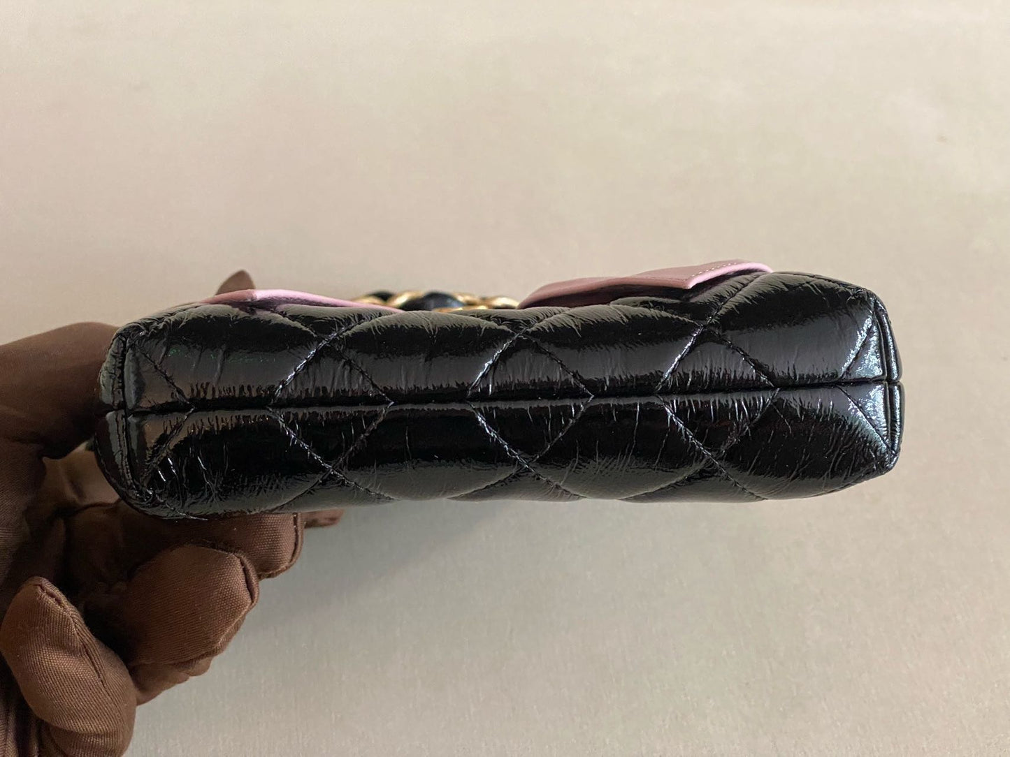 Pre-owned Certified Chanel Ribbon Clutch with Chain in Shiny Black Calfskin with Golden Hardware, microchipped, 2024, w/ dust bag