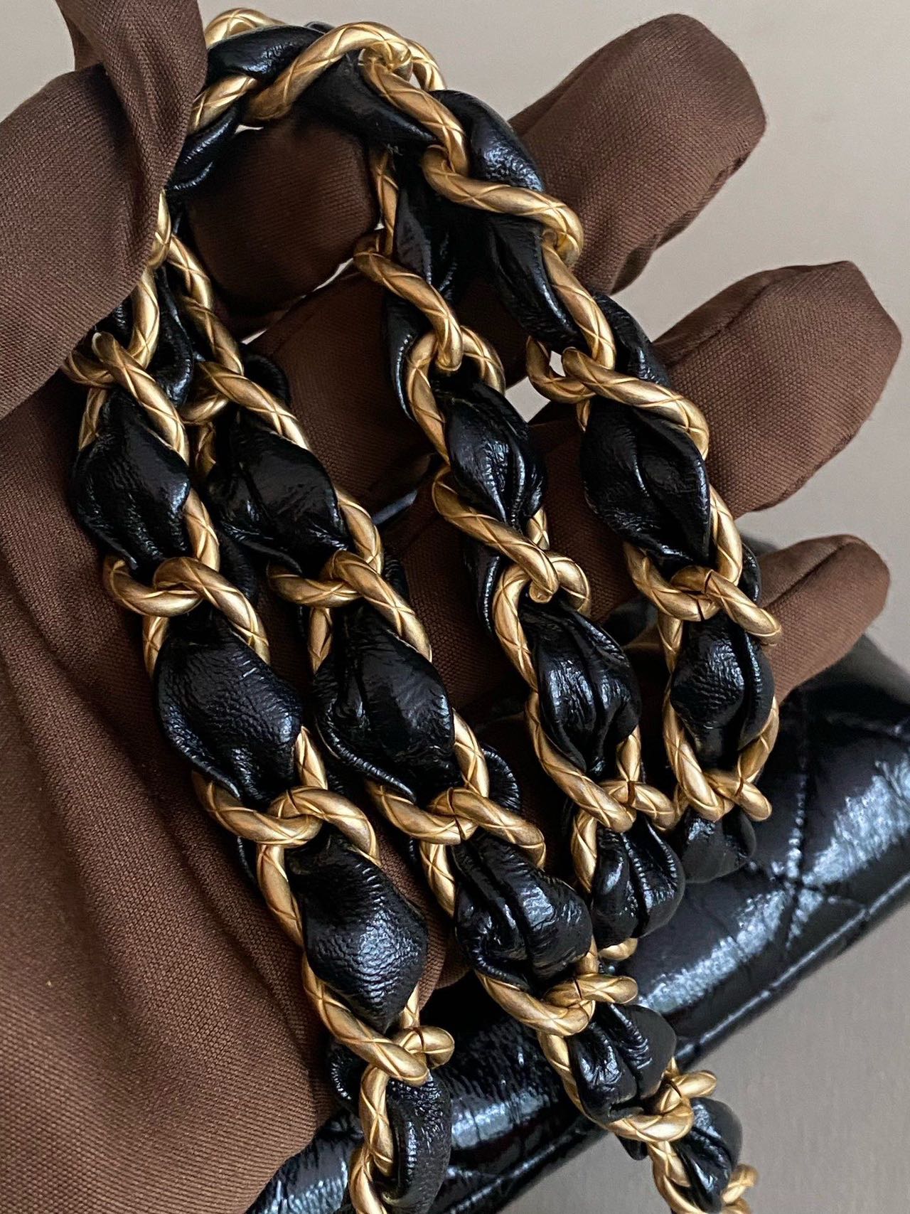 Pre-owned Certified Chanel Ribbon Clutch with Chain in Shiny Black Calfskin with Golden Hardware, microchipped, 2024, w/ dust bag