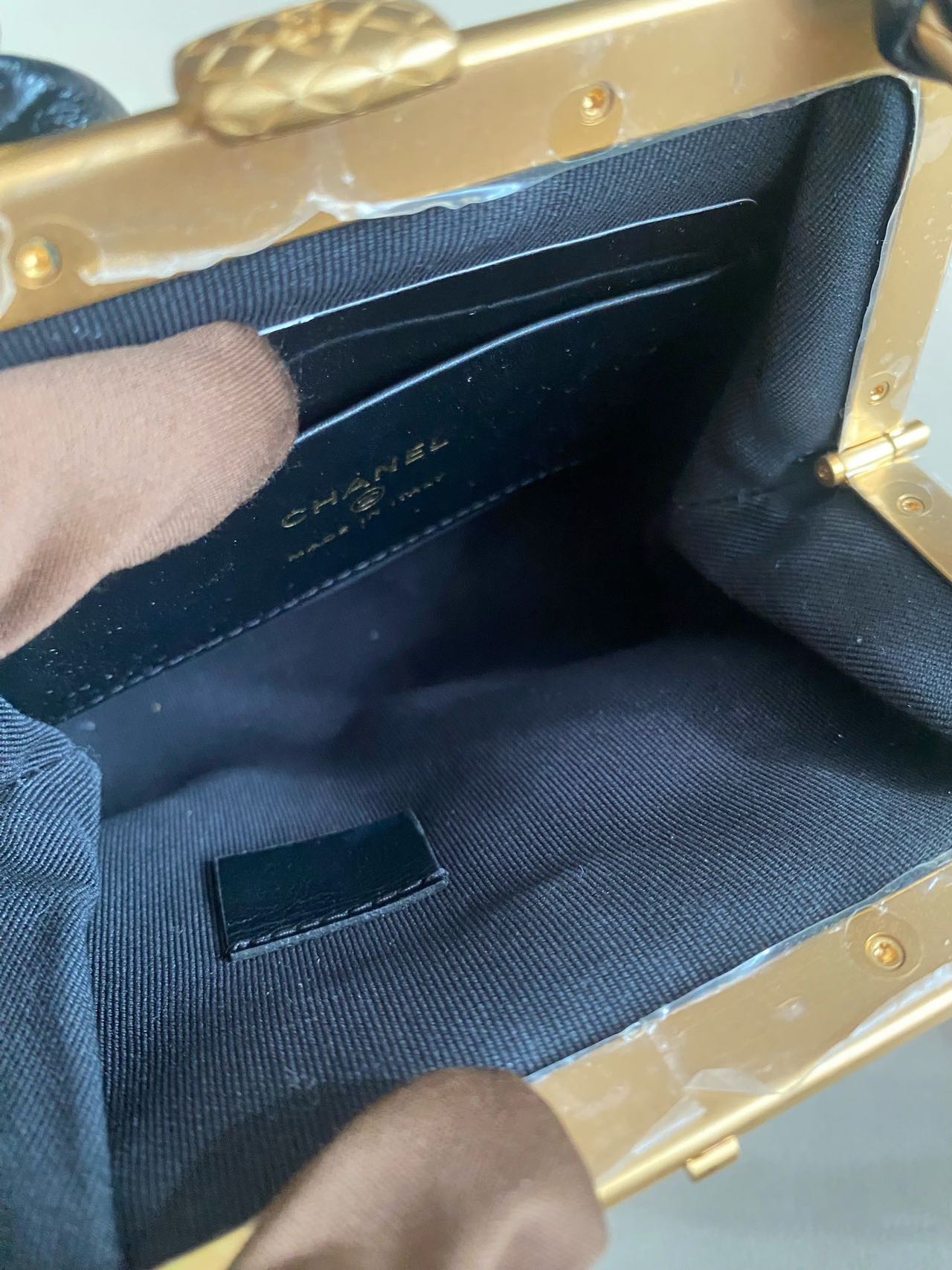 Pre-owned Certified Chanel Ribbon Clutch with Chain in Shiny Black Calfskin with Golden Hardware, microchipped, 2024, w/ dust bag