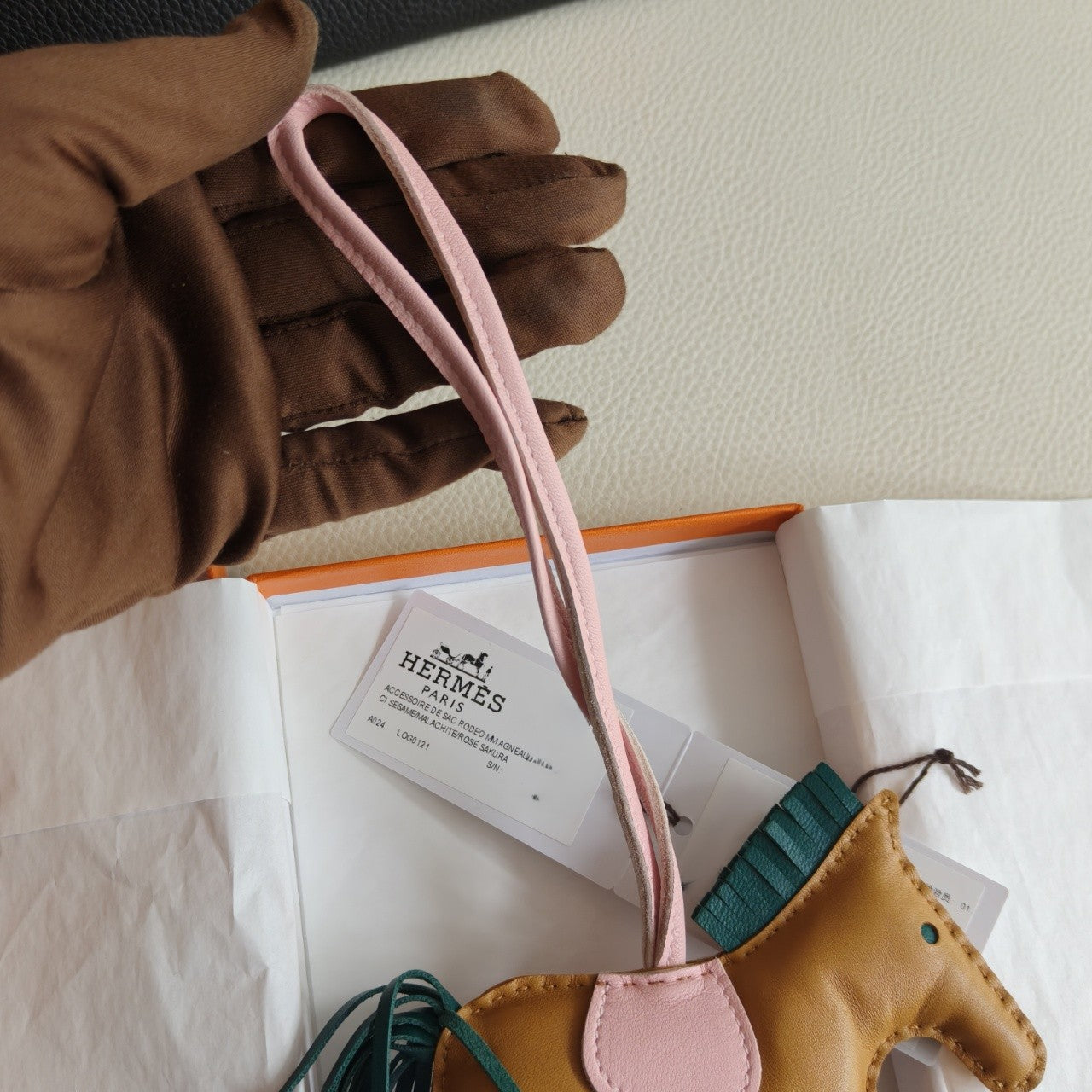 Pre-owned Certified Hermes Medium Rodeo Charm in Sesame Lambskin with Malachite and Rose Sakura, 2020, w/ box