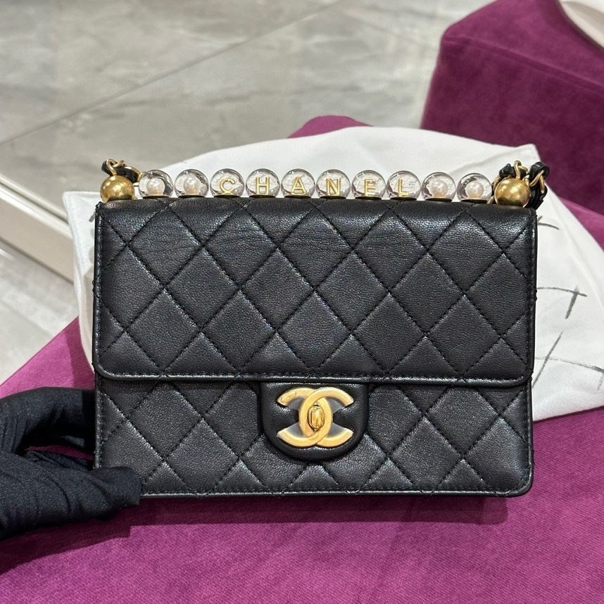 Chanel pearl outlet flap bag 2020