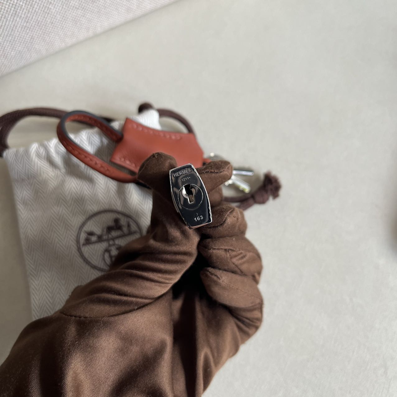 Pre-owned Certified Hermes Kelly 25 Toile Cuivre with Silver Hardware, 2022, Full Set