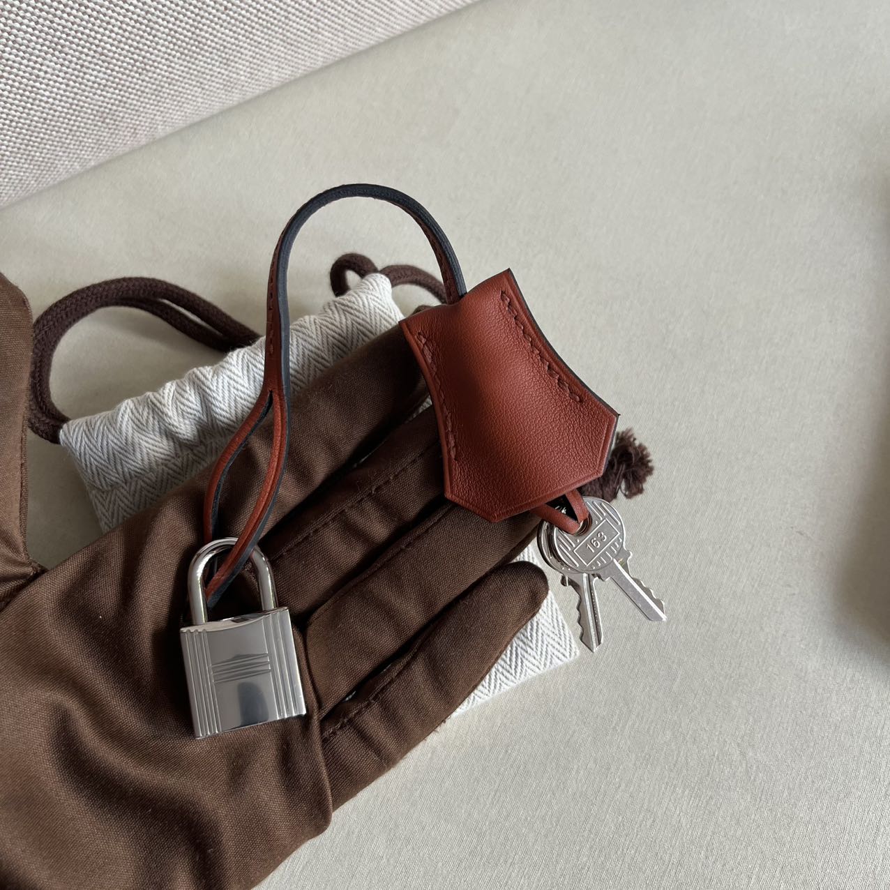 Pre-owned Certified Hermes Kelly 25 Toile Cuivre with Silver Hardware, 2022, Full Set