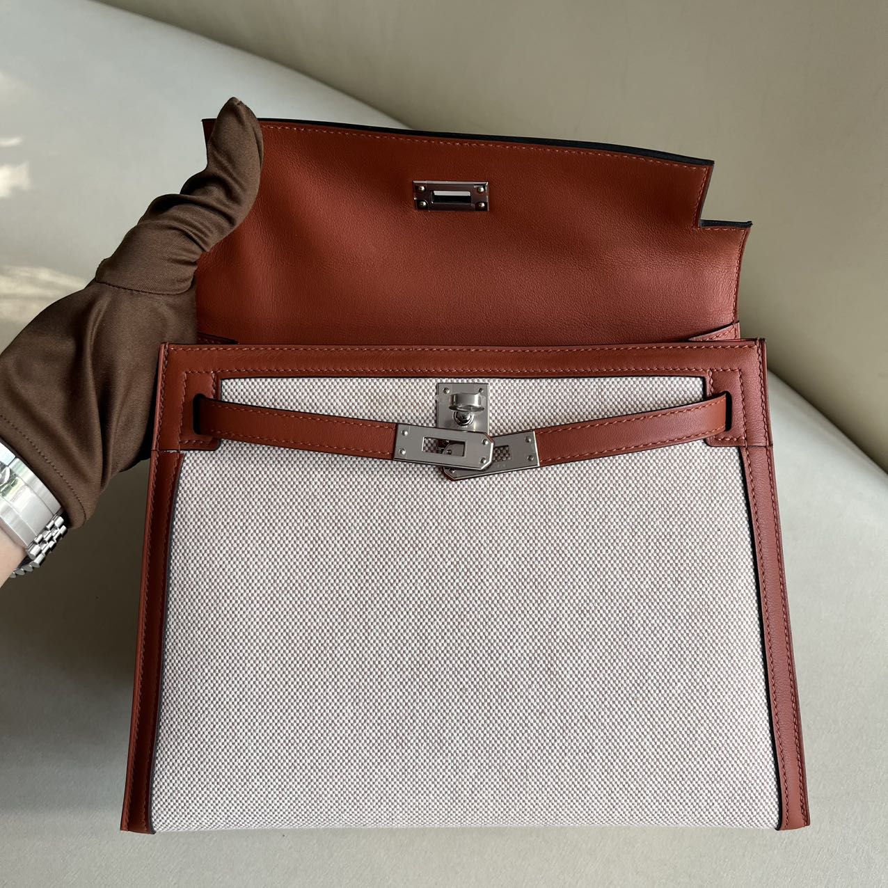 Pre-owned Certified Hermes Kelly 25 Toile Cuivre with Silver Hardware, 2022, Full Set