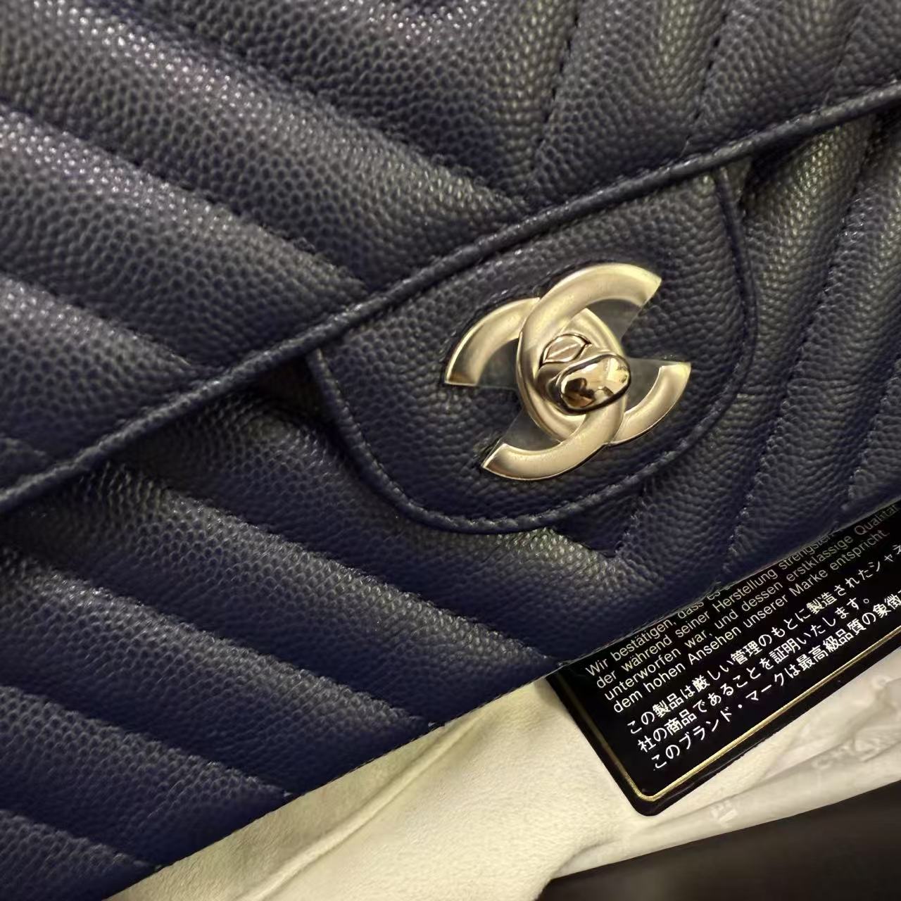Pre owned Medium Classic Flap Navy Blue Chevron Qiulted Caviar Leather Silver Hardware 2016