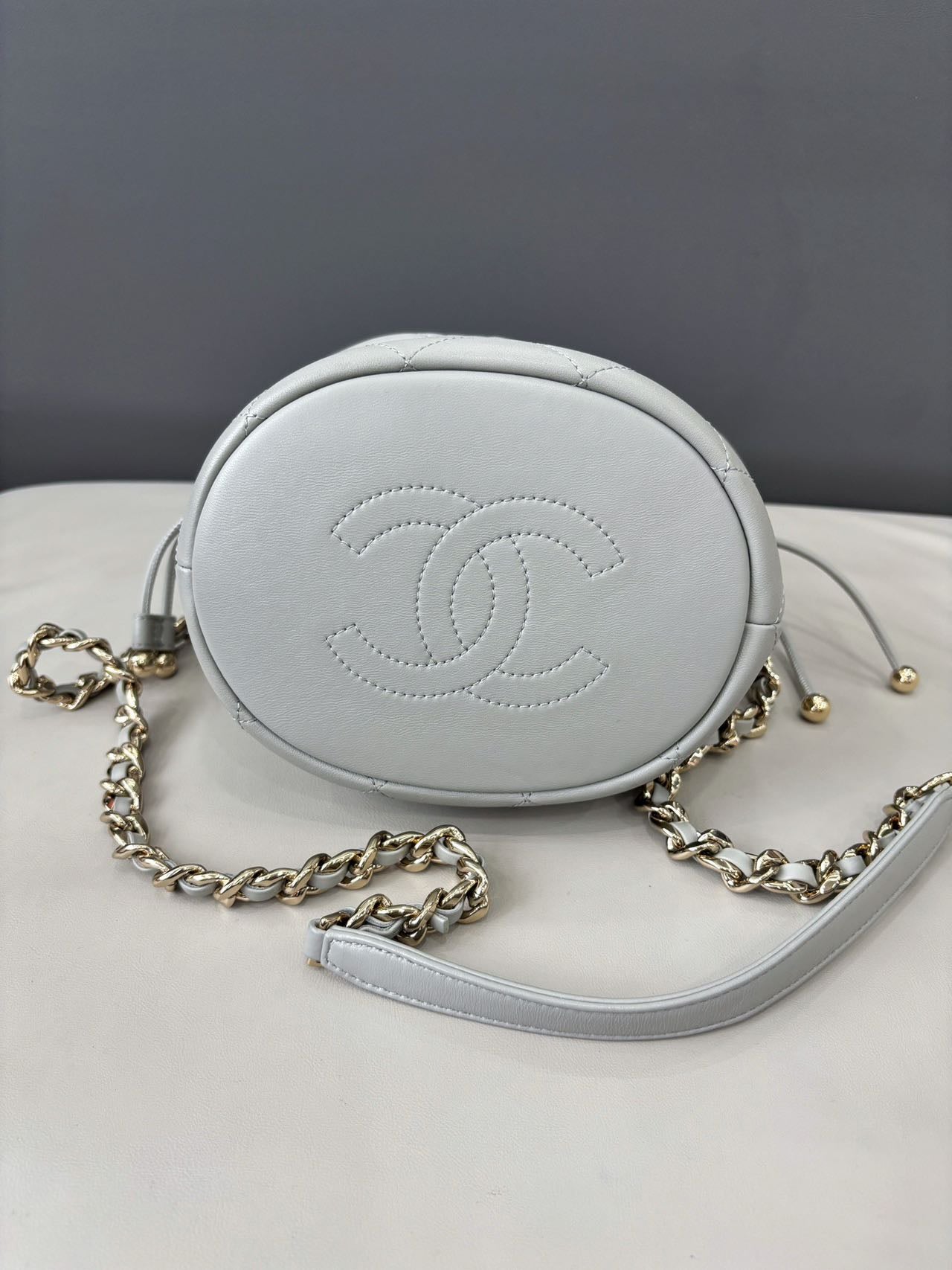 Pre-owned Certified Chanel Quilted Bucket Bag in Gray Calfskin with Golden Hardware, 2022 Microchipped, w/ Dust bag