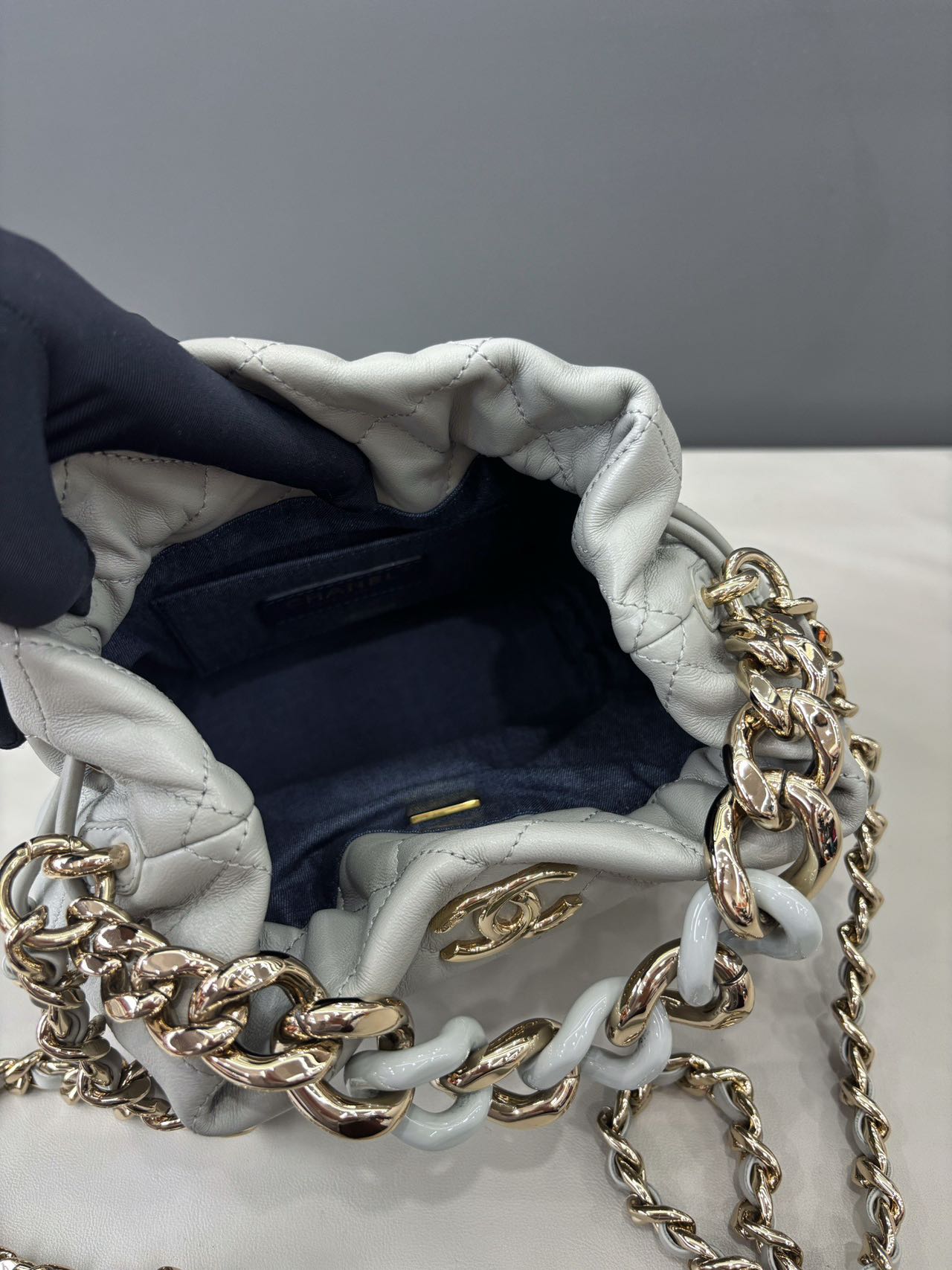 Pre-owned Certified Chanel Quilted Bucket Bag in Gray Calfskin with Golden Hardware, 2022 Microchipped, w/ Dust bag