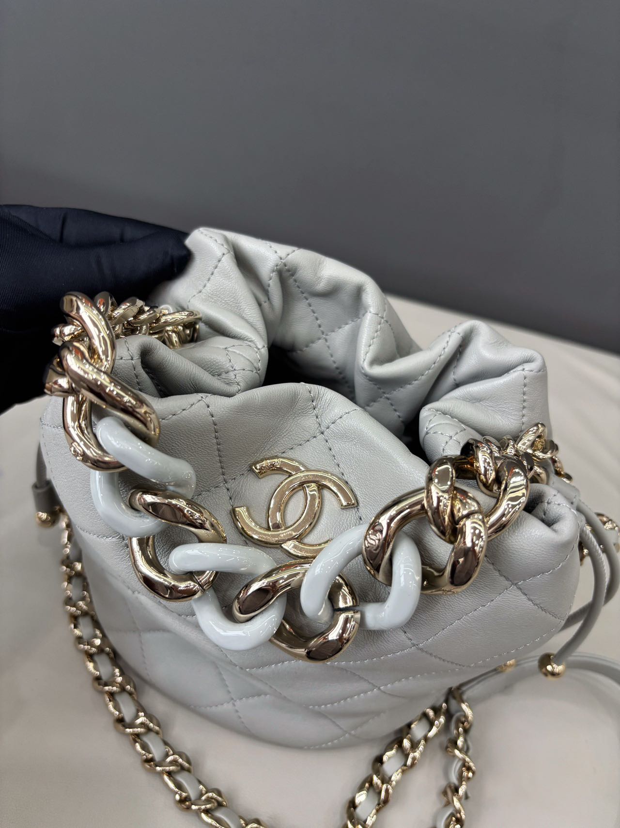Pre-owned Certified Chanel Quilted Bucket Bag in Gray Calfskin with Golden Hardware, 2022 Microchipped, w/ Dust bag