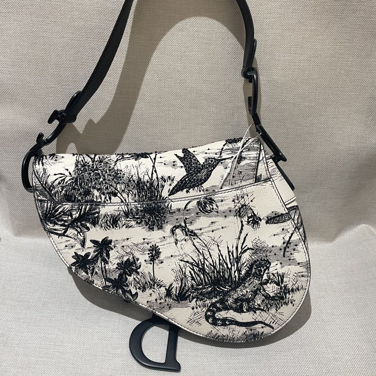 Pre-owned Certified Dior Medium Saddle in White Calfskin with Black Tropical Embroidery, with So Black Hardware, 2019, w/ dust bag
