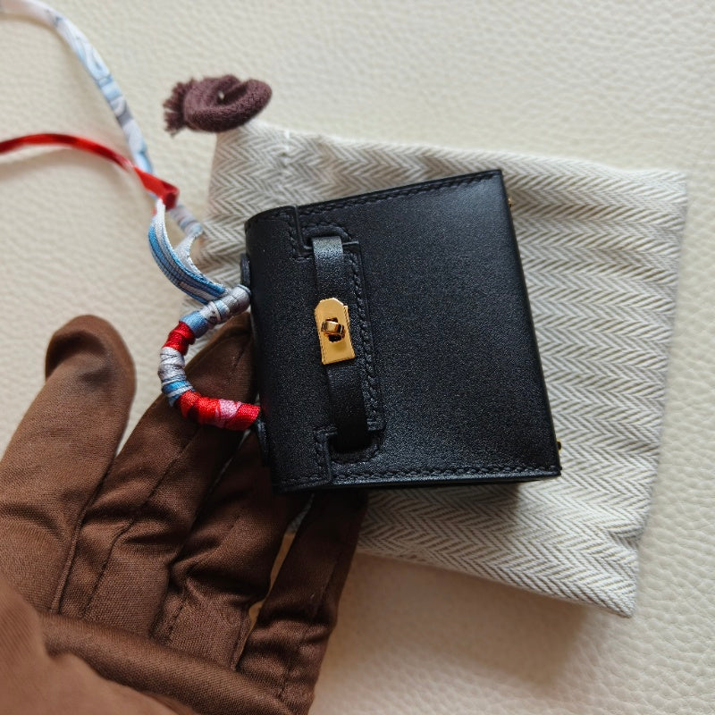 Pre-owned Certified Hermes Kelly Twilly Bag Charm in Black Swift Leather with Golden Hardware, w/ box