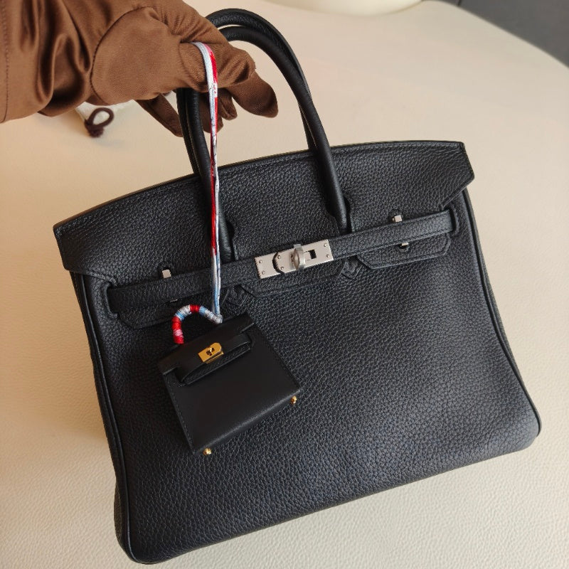Pre-owned Certified Hermes Kelly Twilly Bag Charm in Black Swift Leather with Golden Hardware, w/ box