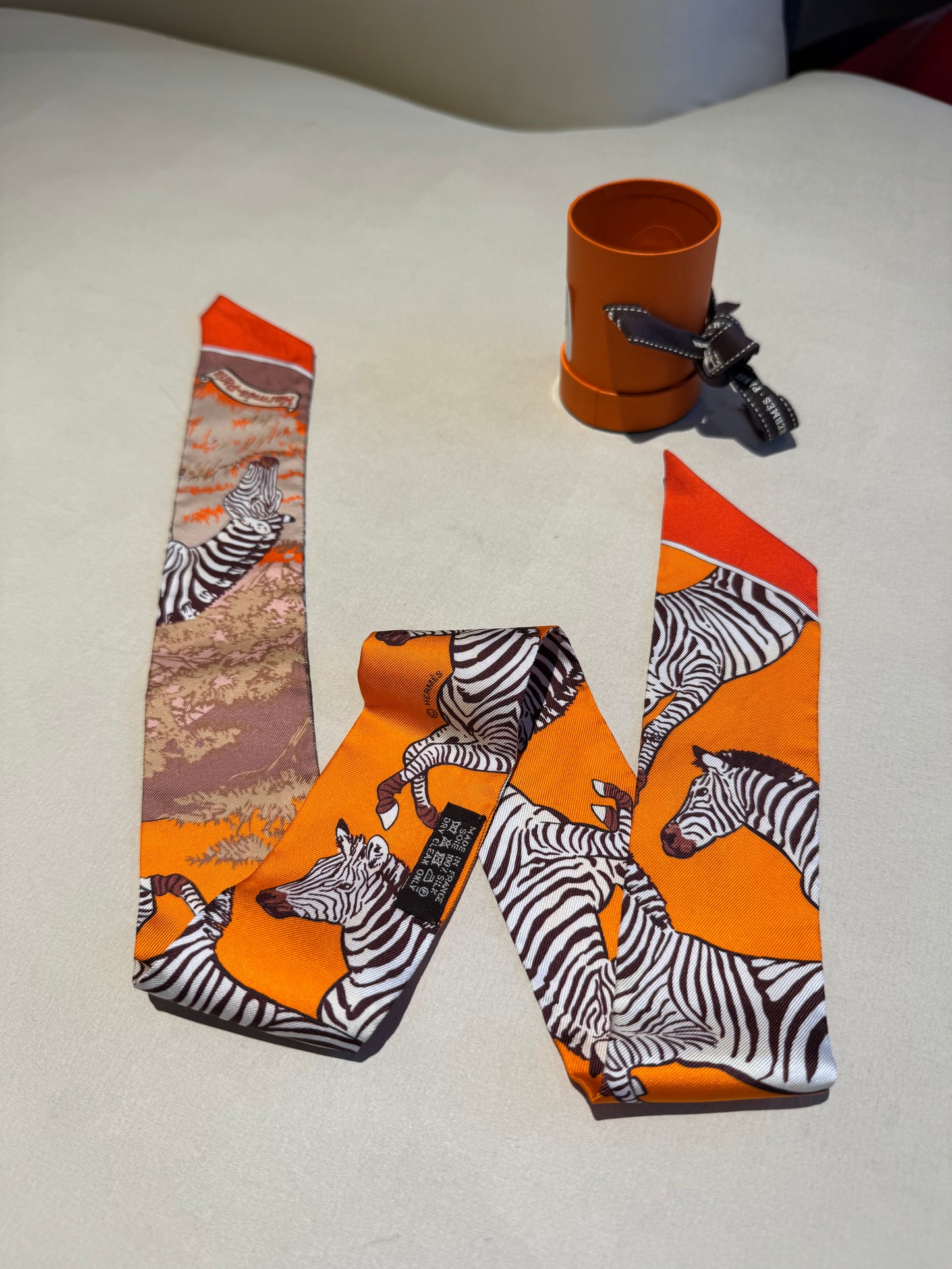 Not Used Hermes Silk Twilly Zebras in Orange and Browns, w/ box