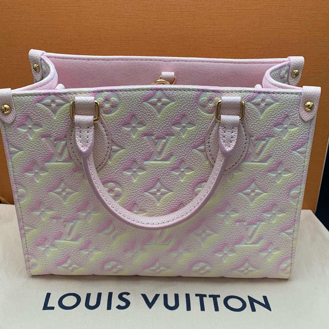 Pre-owned LV Louis Vuitton OnTheGo PM Stardust Light Pink microchipped