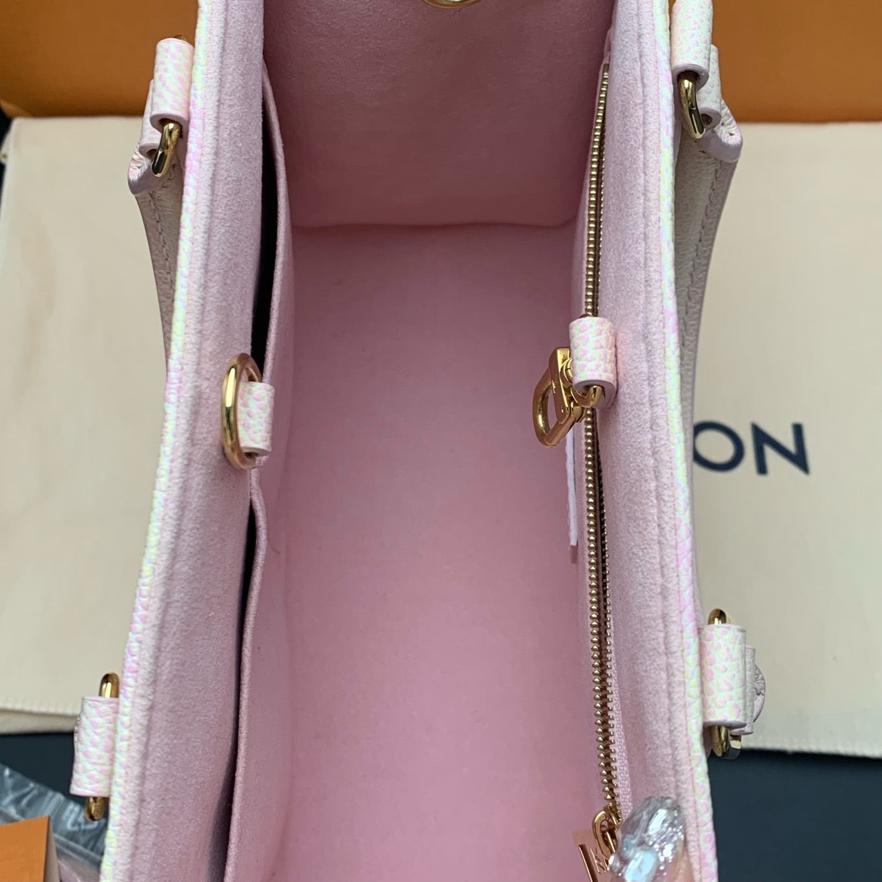 Pre-owned LV Louis Vuitton OnTheGo PM Stardust Light Pink microchipped