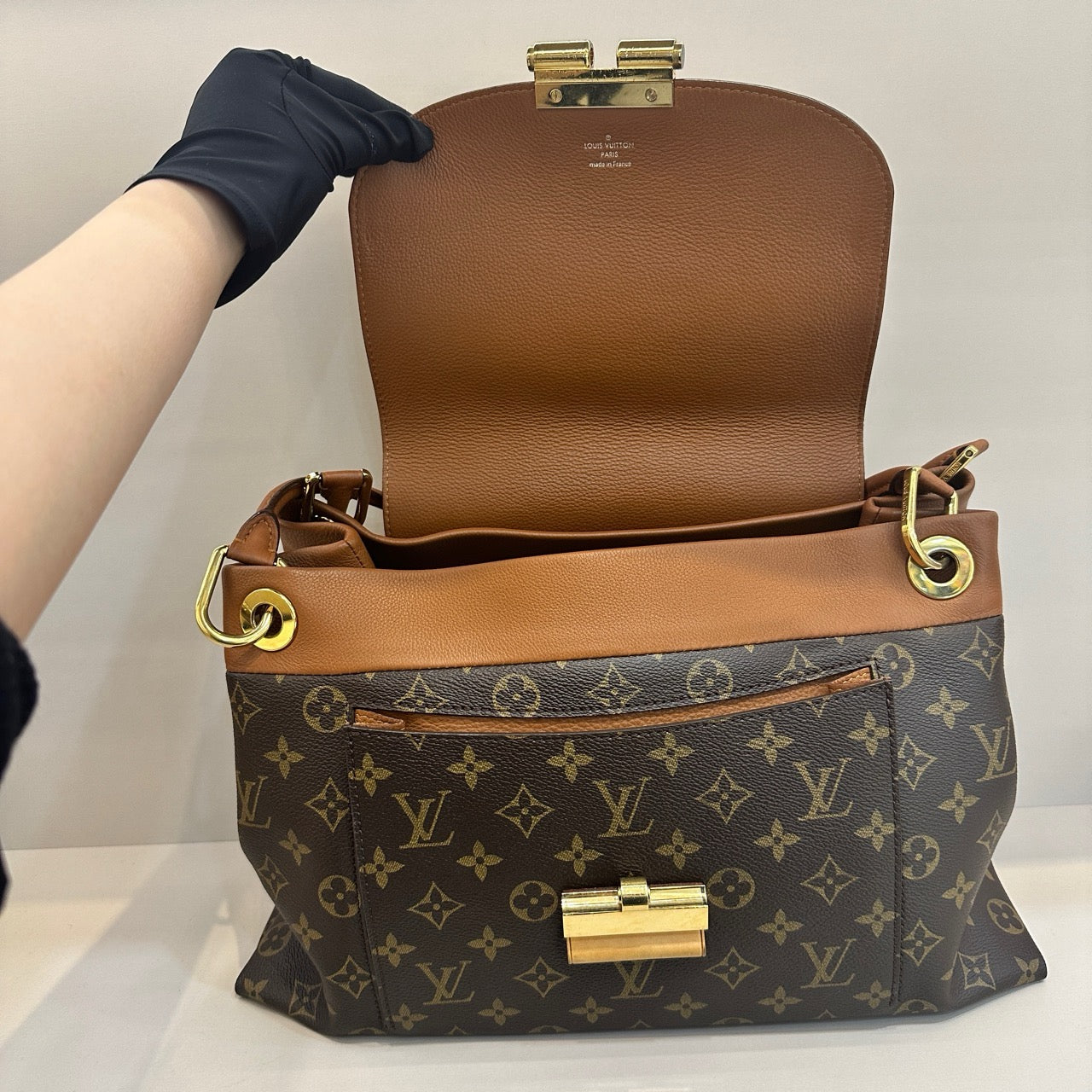 Pre-owned LV Olympe Monogram with Brown Accents