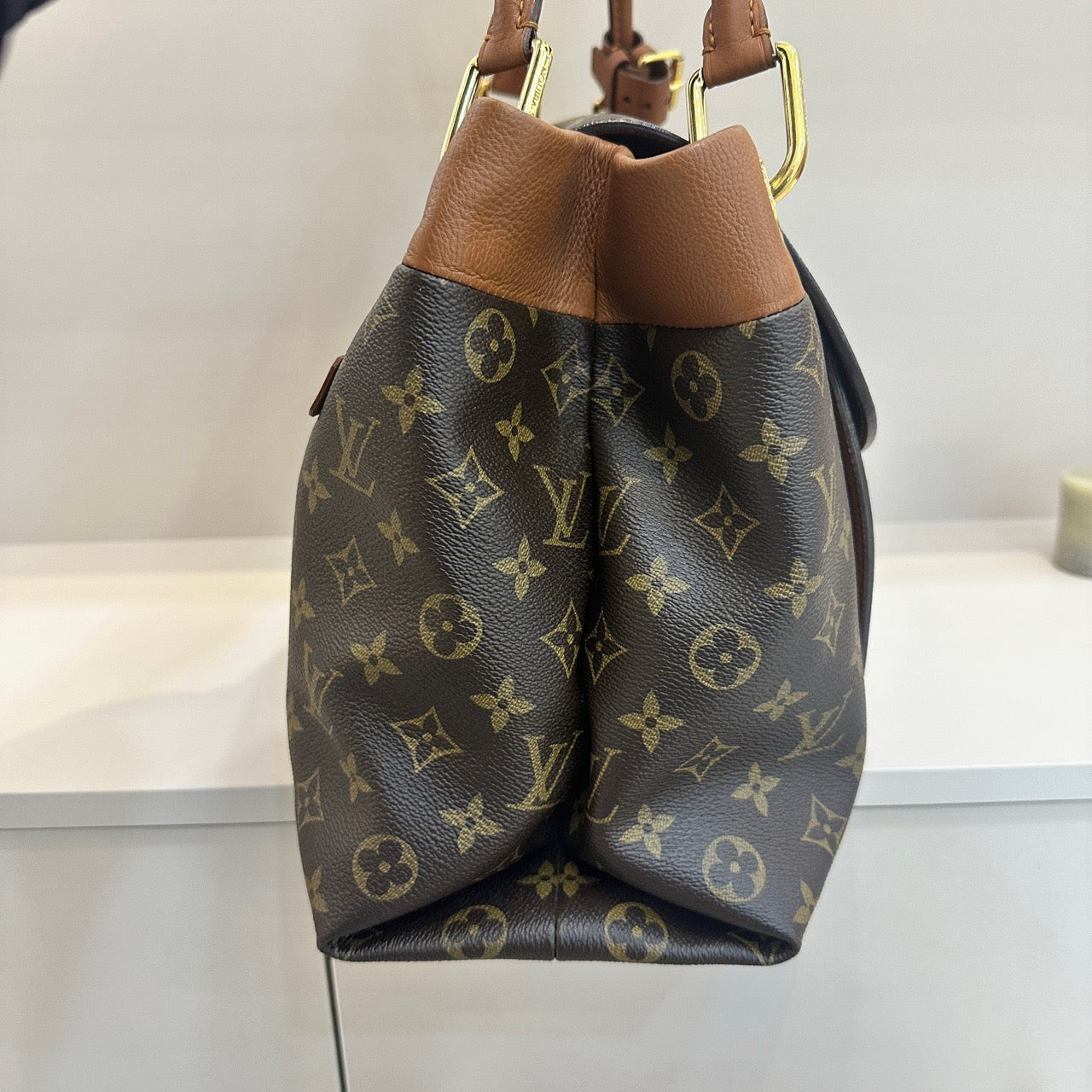 Pre-owned LV Olympe Monogram with Brown Accents