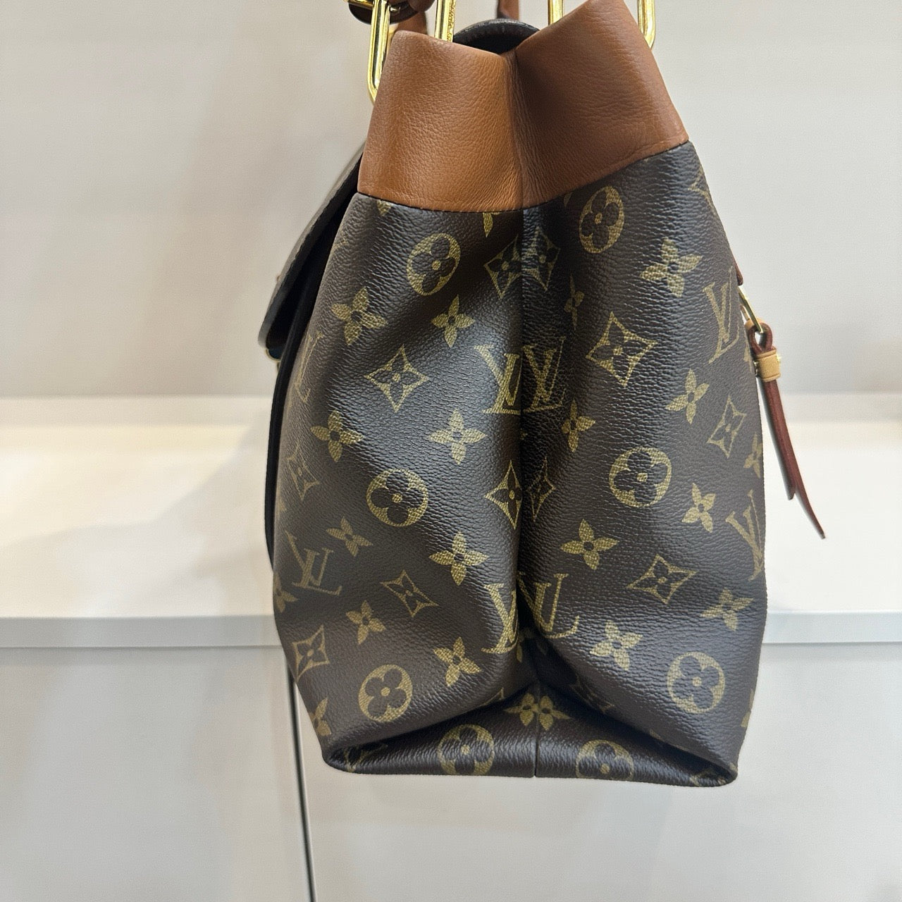 Pre-owned LV Olympe Monogram with Brown Accents