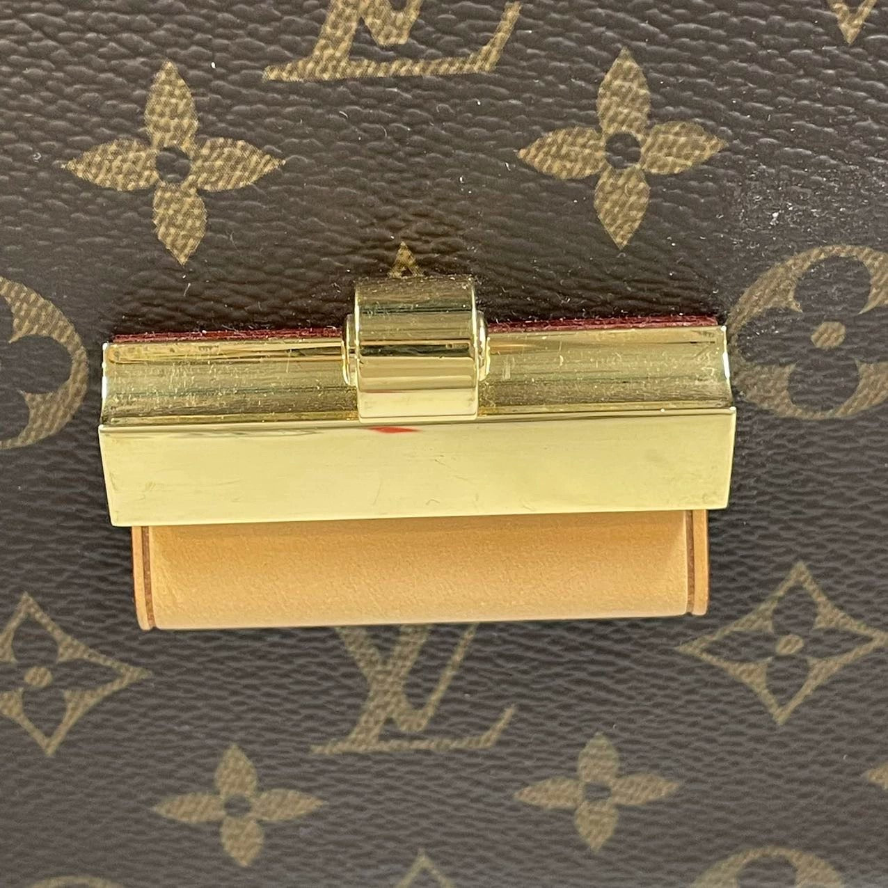 Pre-owned LV Olympe Monogram with Brown Accents, set with a long monogram strap