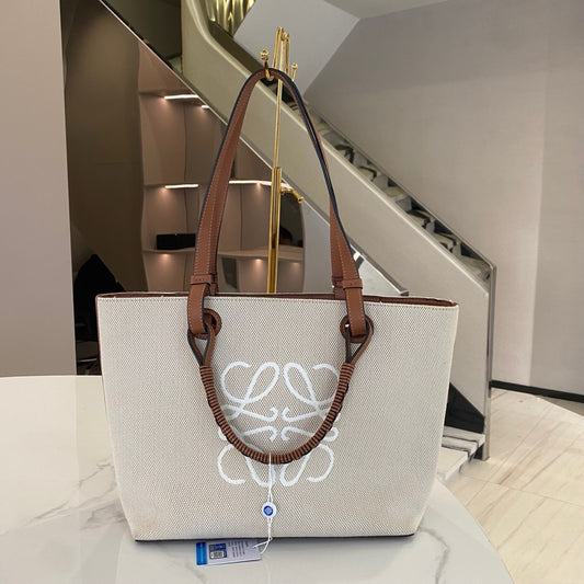 New Gems | Loewe Anagram Canvas Tote with Brown Calfskin trim A+ Condition