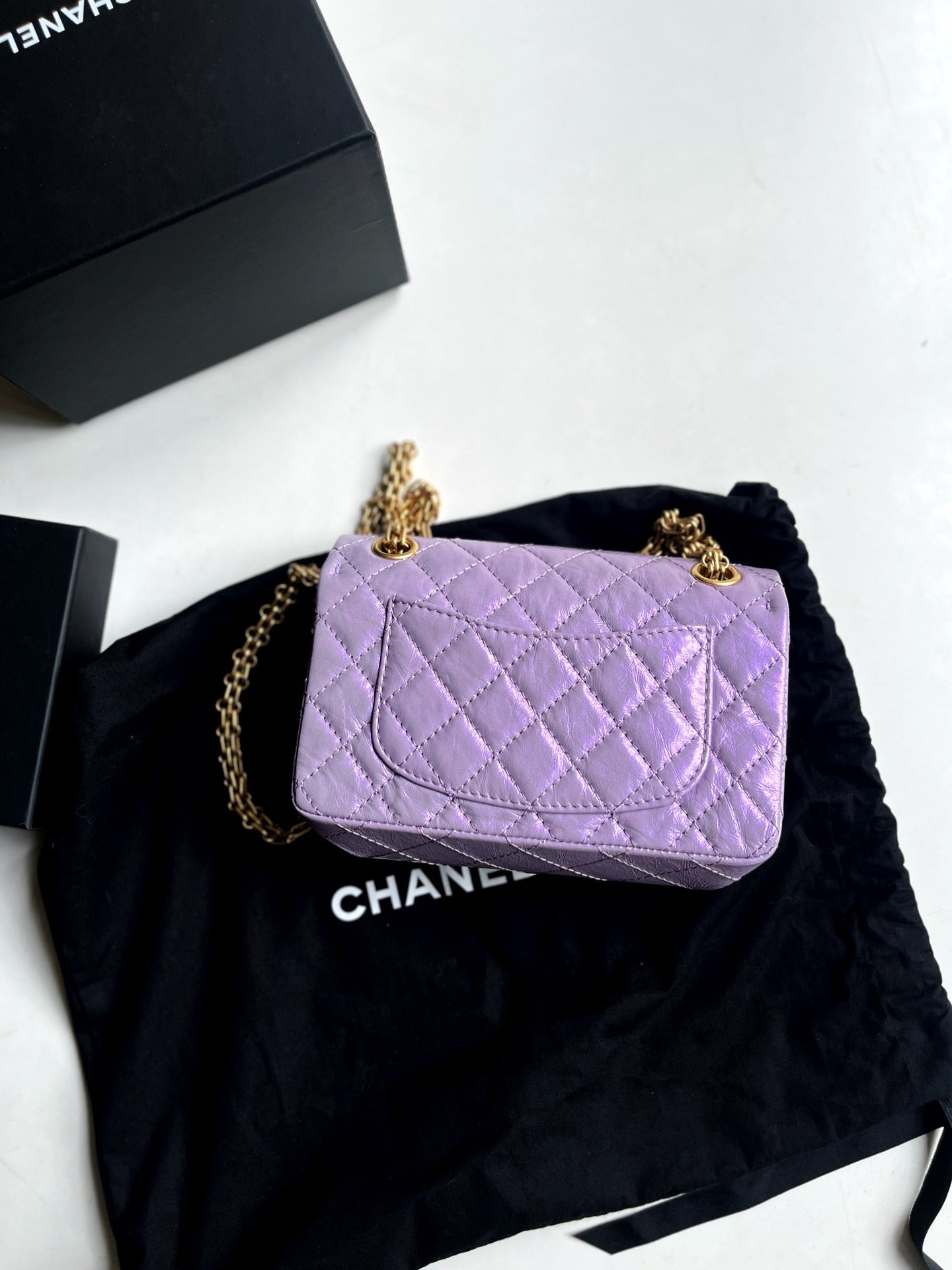 Pre-owned Chanel 2.55 Reissue Metallic Lilac Golden hw, Microchipped, w/ dust bag