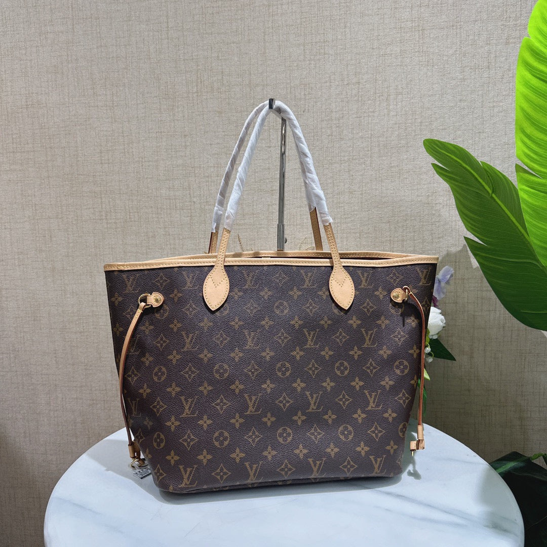 Pre-owned LV Louis Vuitton Neverfull MM with Fuchsia interior w/ Microchip