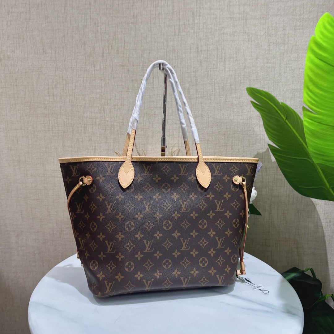 Pre-owned LV Louis Vuitton Neverfull MM with Fuchsia interior w/ Microchip