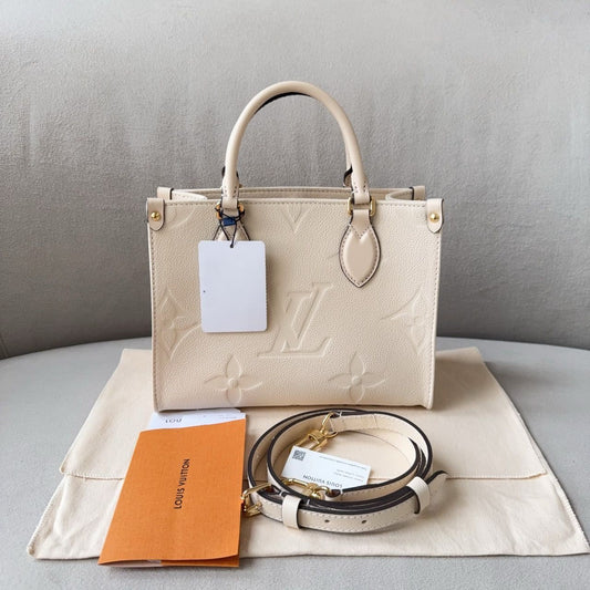 Pre-owned Certified LV Louis Vuitton OnTheGo PM in Cream White Monogram Empreinte Leather with Golden Hardware, 2024 Microchipped, w/full set
