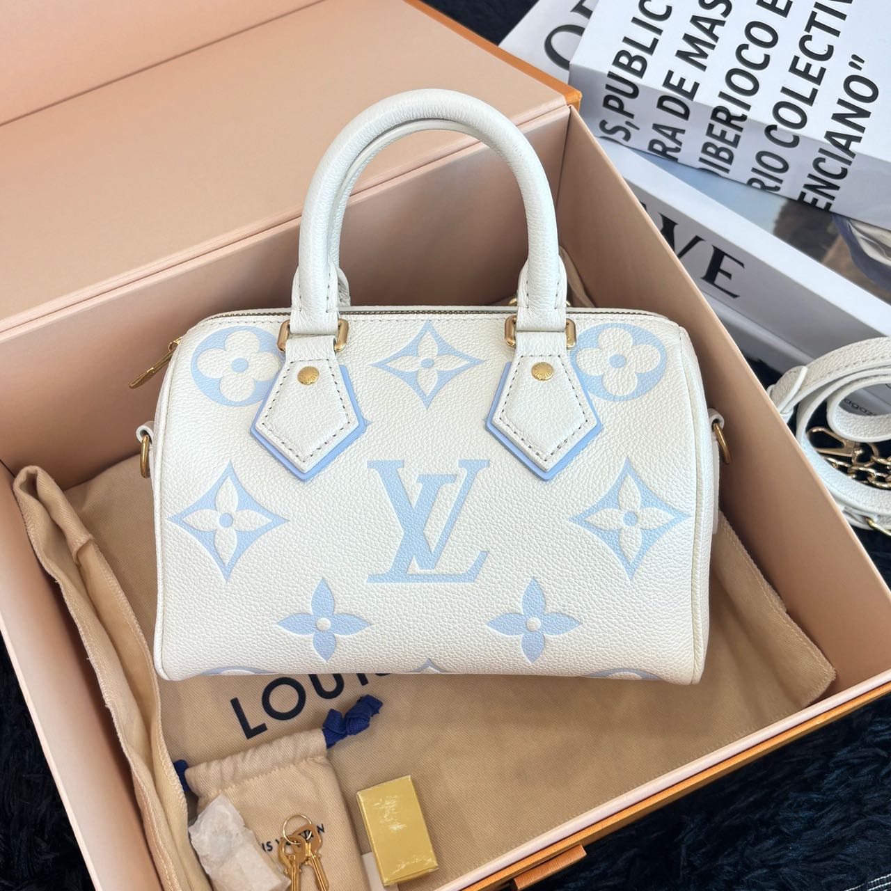 Pre-owned Certified Louis Vuitton LV Speedy Bandoulière 20 in Milky white and Blue Monogram Empreinte leather with Golden Hardware, w/ full set